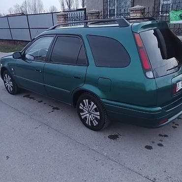 знак аварийной остановки: Toyota Corolla: 2000 г. — 1