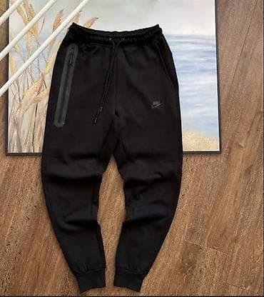 спес одежда: Мужские брюки, Стандарт, Nike Windrunner, Новый, цвет - Черный — 1