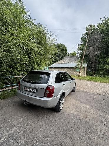 пасат бы 3: Mazda Familia: 2002 г., 1.3 л, Бензин, Универсал — 4