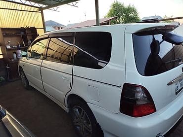 а 8: Honda Odyssey: 2001 г., Универсал — 6