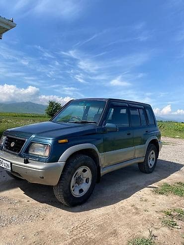 сары булун: Suzuki Escudo: 1996 г., 2 л, Автомат, Бензин, Жол тандабас — 3