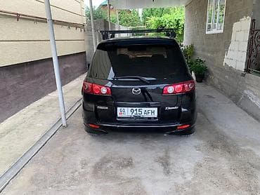 2 8: Mazda Demio: 2004 г., Хэтчбэк — 4