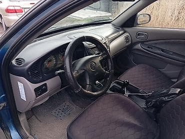 жеңил машина: Nissan Almera: 2001 г., 1.8 л, Кол менен иштөөчү, Бензин, Седан — 6