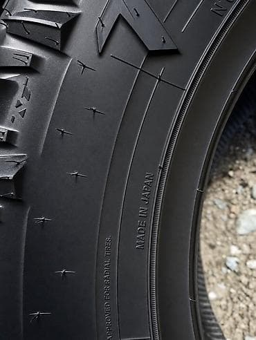 шумов: Шины для внедорожника Nitto Trail Grappler M/T, размер 285/65 R18 — 2