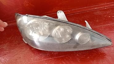 Желдетүү, муздатуу жана жылытуу: Алдыңкы сол фара Toyota 2005 г., Колдонулган, Оригинал, АКШ — 2