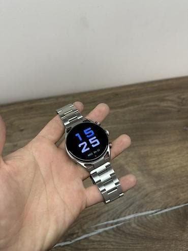 a 90: Умные часы c круглым сенсорным дисплеем и металлическим браслетом - — 1