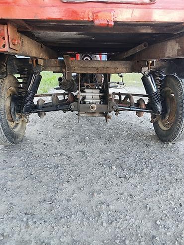 трёх калёсный скутер: Грузовой мотороллер-трицикл с кузовом Описание: - Компоновка — 6