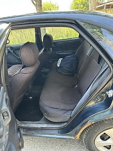 авто сатылат: Toyota Carina E: 1996 г., 1.8 л, Кол менен иштөөчү, Бензин, Лифтбек — 8