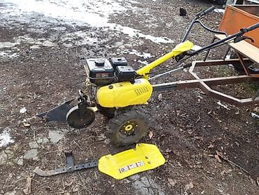 Мотоблок ROLF (бензиновый), желтый цвет. Универсальный агрегат для