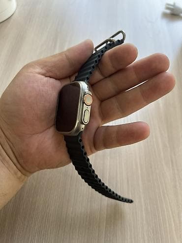 сколько стоит xs: Apple Watch Ultra (49 мм), титановый корпус, чёрный ремешок Ocean — 4