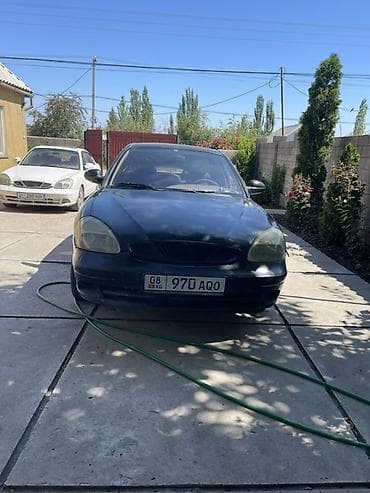 отдам в расрочку: Автомобиль седан, черный цвет, 4 двери. Киргизские номера. Механика — 1
