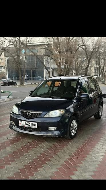 битую машину: Mazda Demio: 2003 г., 1.3 л, Автомат, Бензин, Хэтчбэк — 3