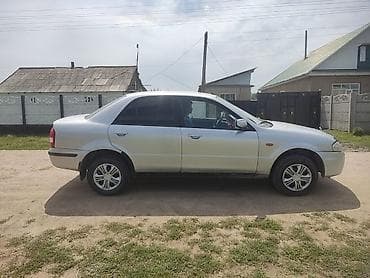 Mazda 323: 2000 г., 1.5 л, Бензин, Седан