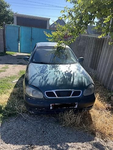 Унаа: Daewoo Lanos: 1997 г., 1.5 л, Кол менен иштөөчү, Бензин, Седан — 4