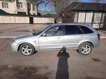 mazda 626 2002: Mazda 323: 2003 г., 1.6 л, Автомат, Бензин, Хэтчбэк — 2