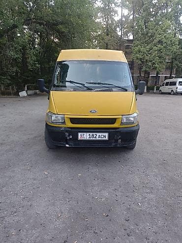 b m w: Грузовой фургон Ford Transit (поколение около 2000-х), жёлтый — 2
