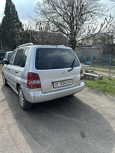 step vagon: Mazda Demio: 2003 г., 1.3 л, Ручные, Бензин, Универсал — 6