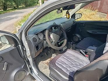 дайхатсу куеро: Daihatsu Cuore: 2005 г., 1 л, Механика, Бензин, Купе — 9