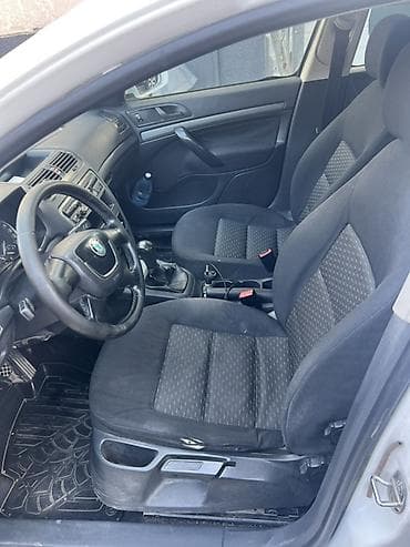 4: Skoda Octavia: 2011 г., 1.4 л, Механика, Бензин, Лифтбек — 7