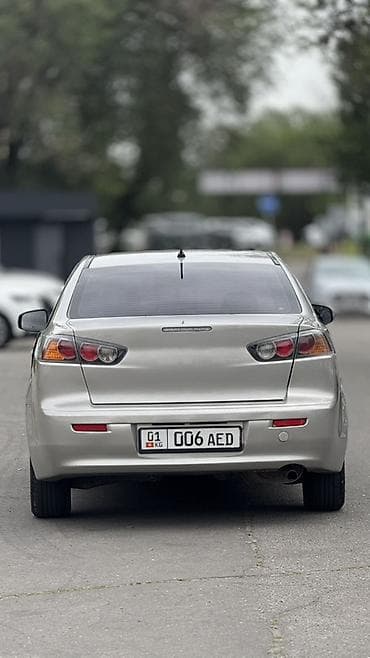 королла 2015: Mitsubishi Lancer: 2015 г., 2 л, Автомат, Бензин, Седан — 2