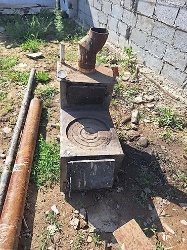 вода буржука: Металлическая печь-буржуйка с варочной поверхностью и водяным — 1