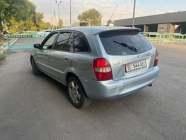 e 303: Mazda 323: 2001 г., 1.6 л, Механика, Бензин, Универсал — 5