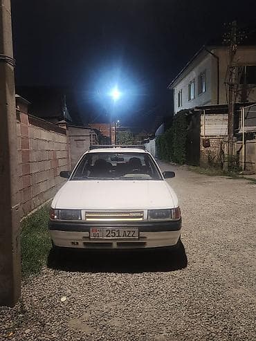 мазда 323 1998: Mazda 323: 1989 г., 1.6 л, Механика, Бензин, Седан — 1