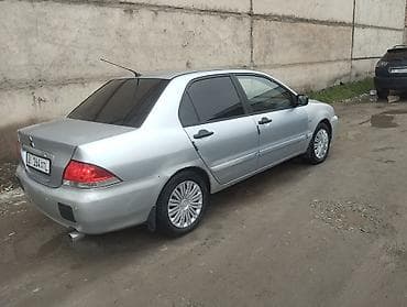 митсубиси спайс стар: Mitsubishi Lancer: 2007 г., 1.3 л, Ручные, Бензин, Седан — 5