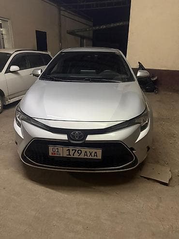 bmw x7 2020: Toyota Corolla: 2019 г., 1.8 л, Гибрид, Седан — 2