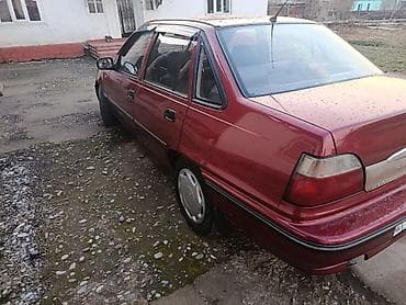 нексия 2005: Daewoo Nexia: 2006 г., Седан — 8