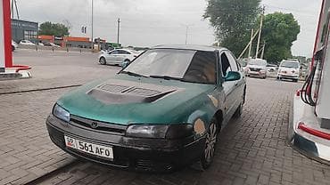Транспорт: Mazda Cronos: 1996 г., 1.8 л, Кол менен иштөөчү, Бензин, Хетчбек — 3