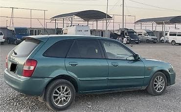 чанган уни к: Mazda 323: 2003 г., Автомат, Бензин, Универсал — 2