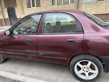 серый daewoo: Daewoo Lanos: 1997 г., Седан — 4