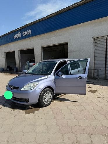 ниссан марч 1998: Mazda Demio: 2005 г., 1.3 л, Автомат, Бензин, Хэтчбэк — 6