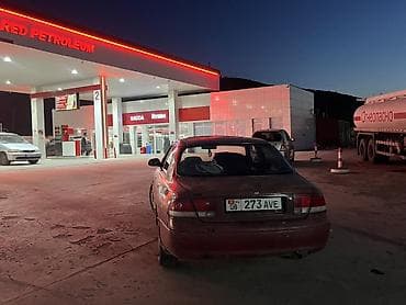 демио парог: Mazda 626: 1992 г., 2 л, Механика, Бензин, Седан — 5