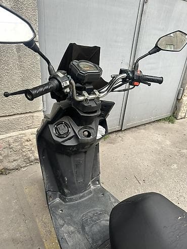 мопед бензин: Скутер ALMOTOR, черный, бензиновый. Основные характеристики: - Кузов — 7