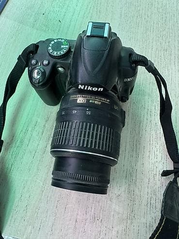 Зеркальная камера Nikon D3000 с комплектным объективом AF‑S DX NIKKOR