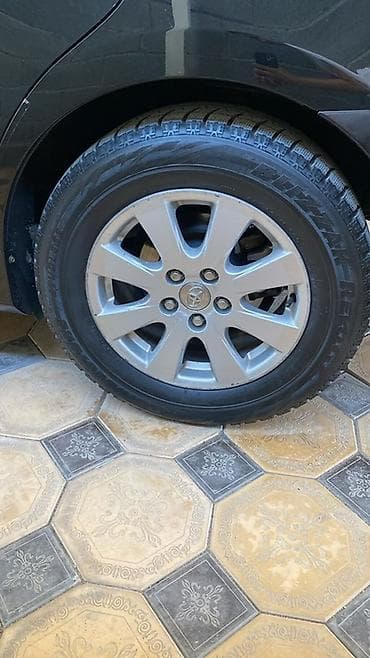 Унаа: Оригинальные колёсные диски Toyota с зимними шинами Bridgestone — 2