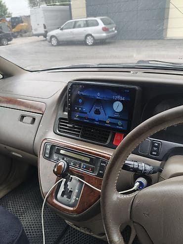 универса: Honda Odyssey: 2001 г., 2.3 л, Автомат, Бензин, Универсал — 9