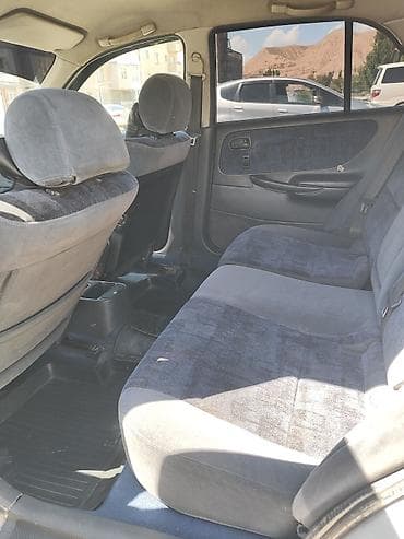 s class w220: Mazda 626: 1999 г., 1.8 л, Механика, Бензин, Хэтчбэк — 8