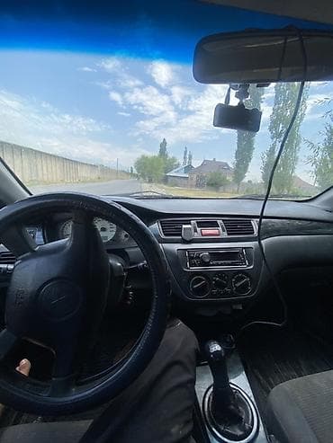 600 кубовый мотоцикл: Mitsubishi Lancer: 2005 г., 1.6 л, Механика, Бензин, Седан — 7