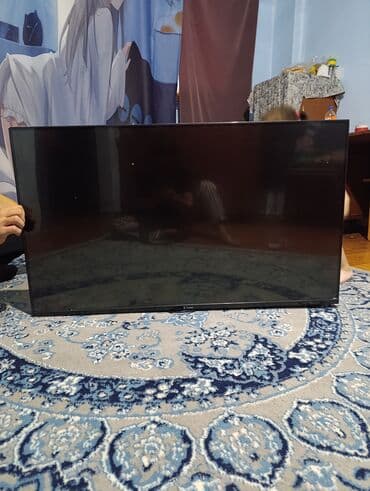 lcd мониторы: Телевизор с плоским экраном черного цвета. Подходит для просмотра — 3