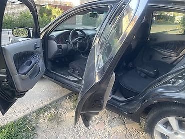 Продажа авто: Nissan Almera: 2002 г., 1.5 л, Механика, Бензин, Хэтчбэк — 8