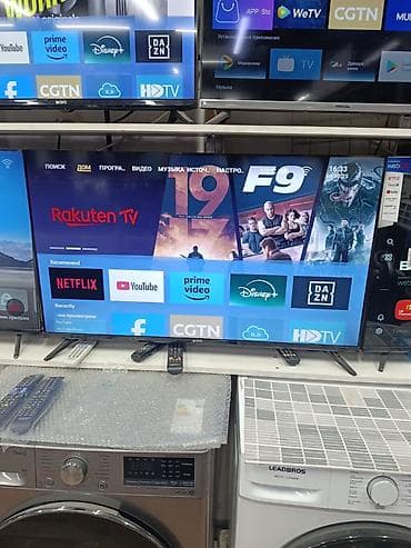 poco g4: Smart TV WOO (диагональ около 55–60", тонкие рамки) на базе webOS — 1