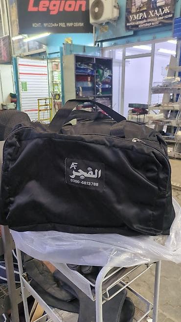 чемодан м: Сумка-рюкзак универсальная, черная - Формат 2 в 1: можно носить как — 1