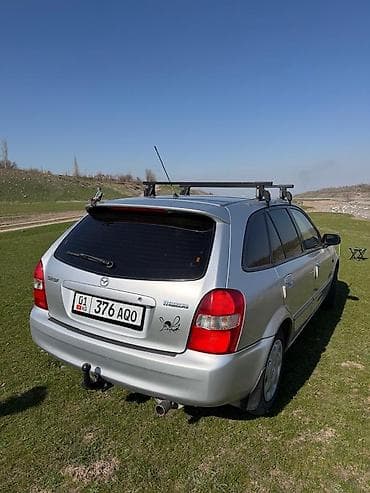 ешка 320: Mazda 323: 2002 г., 1.6 л, Ручные, Бензин, Универсал — 4