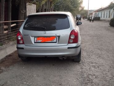 мазда 626 движок: Mazda 323: 1999 г., Хэтчбэк — 3