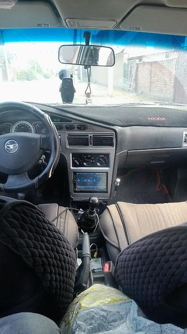 e2 byd: Daewoo Nexia: 2008 г., Механика, Седан — 3