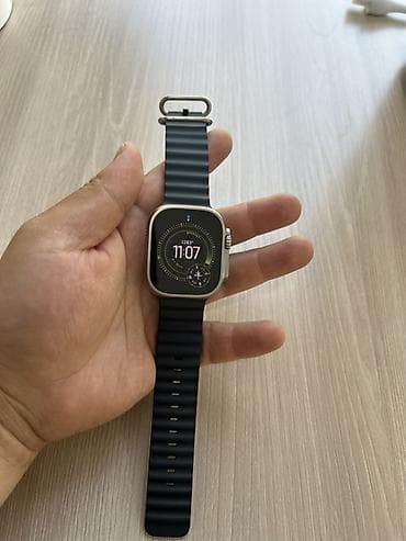 сколько стоит xs: Apple Watch Ultra (49 мм), титановый корпус, чёрный ремешок Ocean — 3