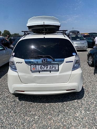colf 2: Honda Fit: 2012 г., 1.3 л, Вариатор, Гибрид, Хэтчбэк — 1